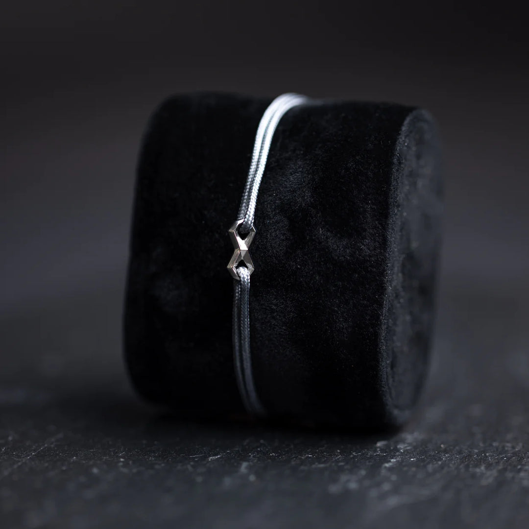 Nylonarmband 1,5 mm, grau, Infinity-Zeichen silber