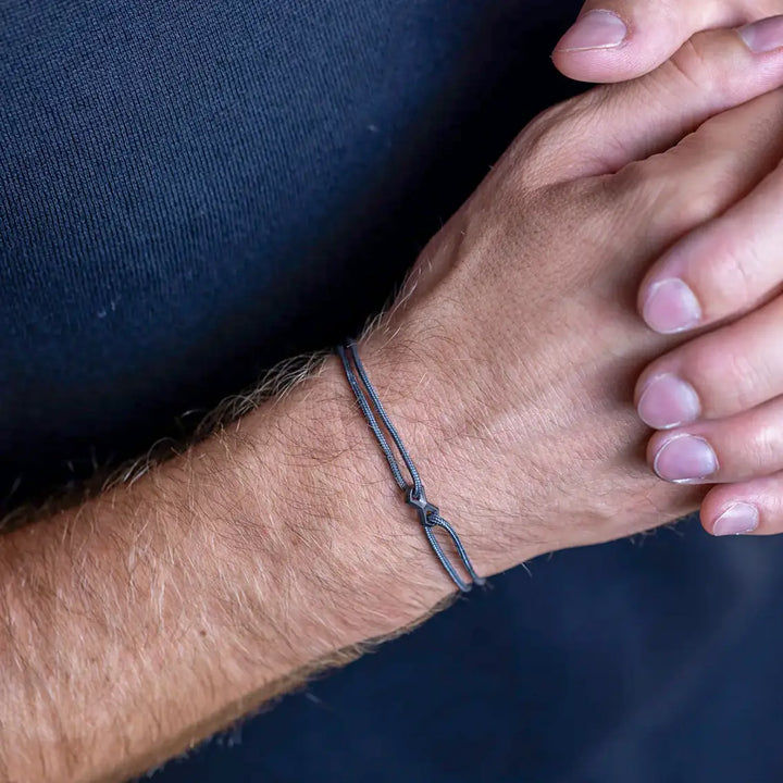 Nylonarmband 1,5 mm, grau, Infinity-Zeichen schwarz
